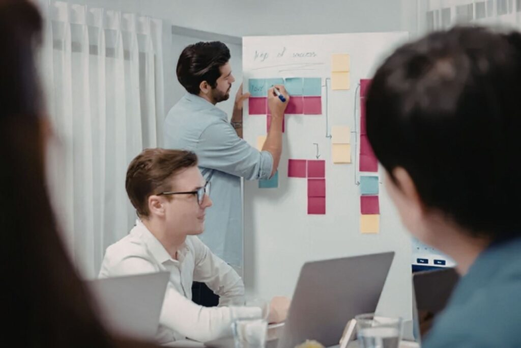 Startup innovation team collaborating in Brooklyn tech hub workspace