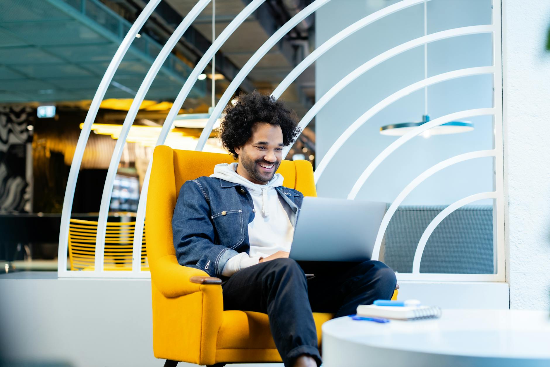 A New York professional uses AI technology tools on a laptop as part of a modern NYC business growth strategy.