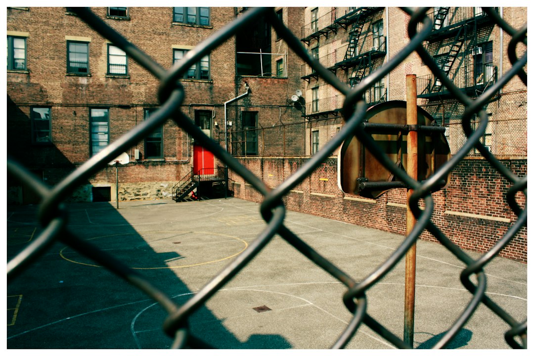 Pickup basketball players competing at Rucker Park in Harlem
