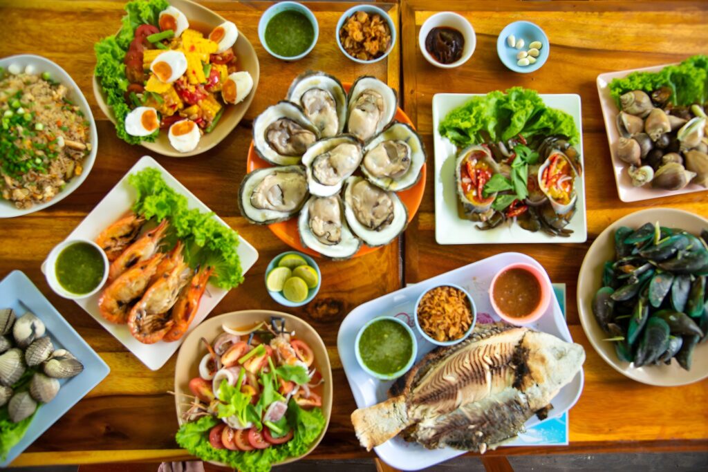 Christmas dinner featuring traditional Italian Seven Fishes feast with fresh seafood and pasta dishes