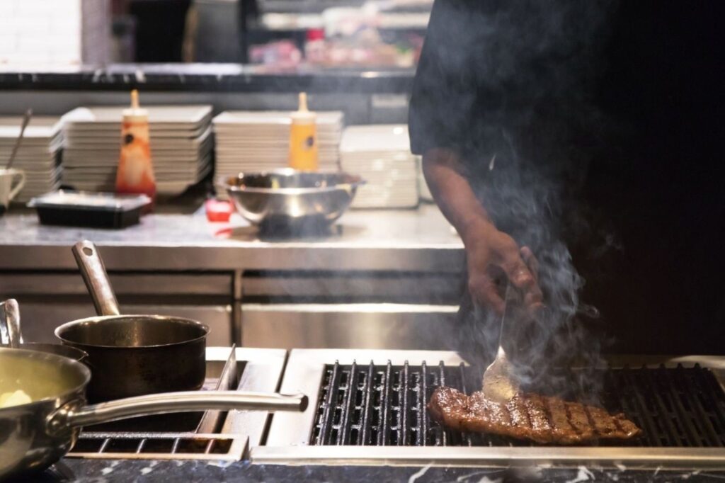 Wagyu beef cooking methods with professional chef using proper techniques for marbling
