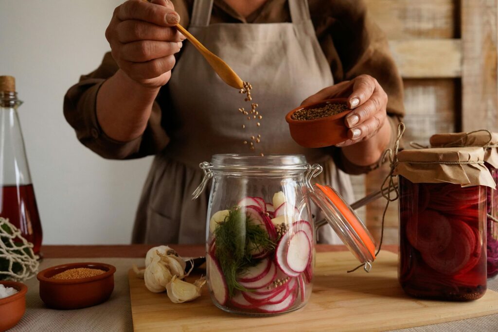 European kitchen preparing fermented vegetables with salt brine and seasonal produce