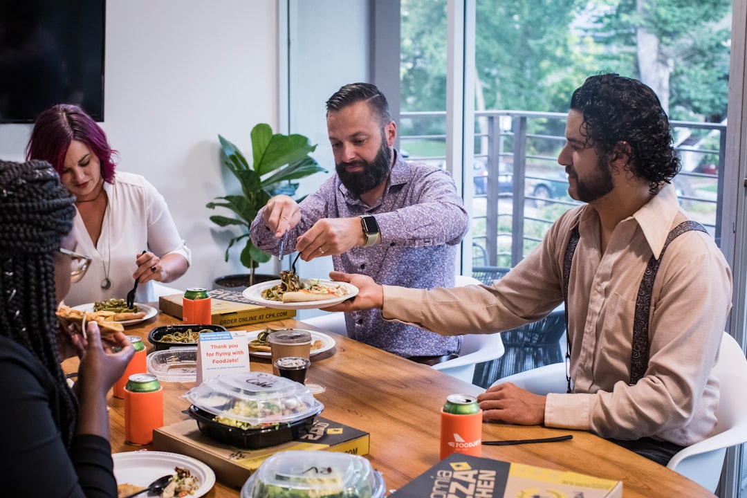 Hotel guests enjoy a regionally inspired meal, illustrating how dining programmes connect people to the local culture.