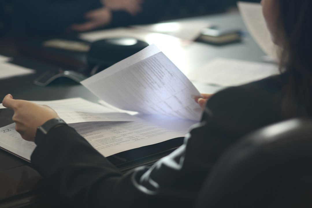 HR consultant reviewing tipping rules policy document