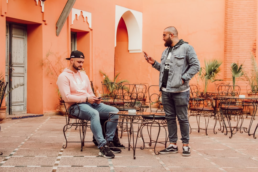 Two entrepreneurs meet outdoors in Essaouira, a city cooled by Atlantic winds even during Morocco's hottest months