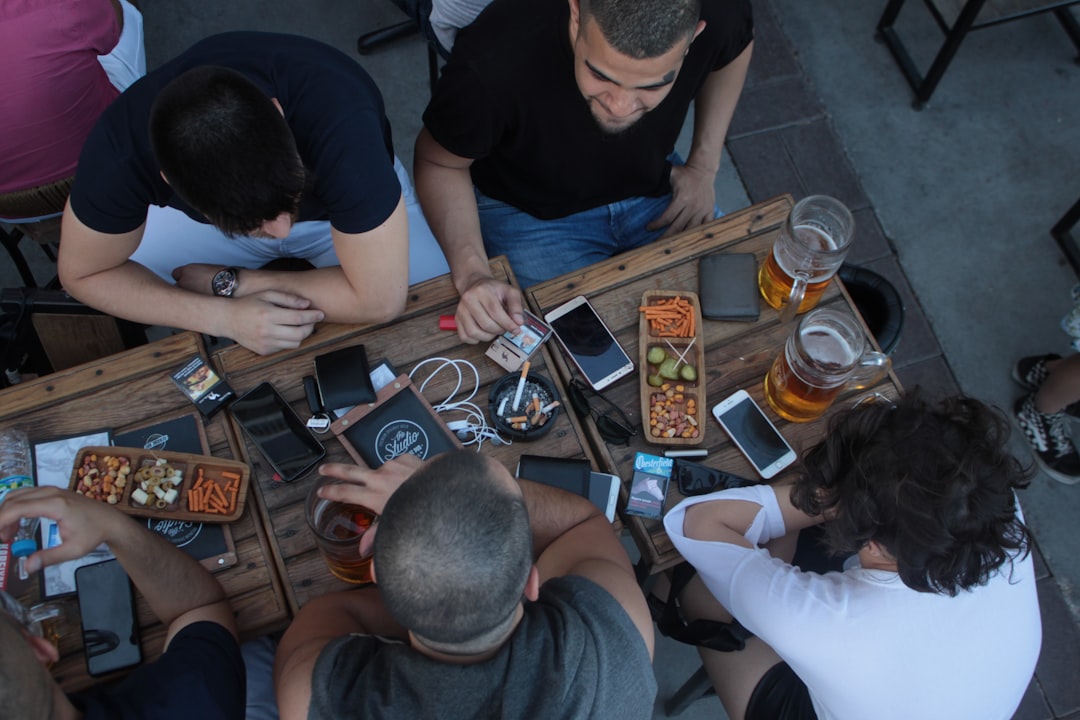 Moroccan youth on smartphones, driving the shift from French to English online