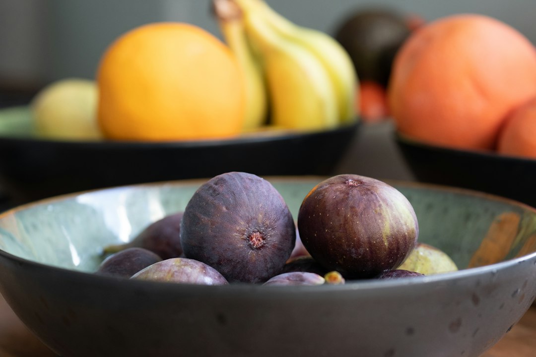 A family shares a September breakfast of fresh figs and msemen, reflecting the warmth of autumn cooking in Morocco