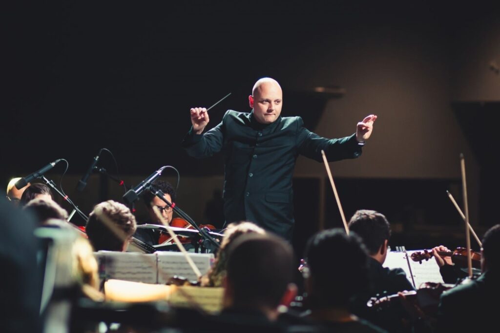 Symphony orchestra performing at Dubai Opera concert Opera Season performance cultural artistic shows