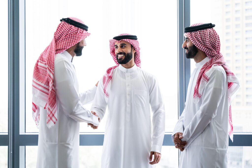 Business entrepreneurs meeting in Dubai freezone to discuss global growth and partnership opportunities