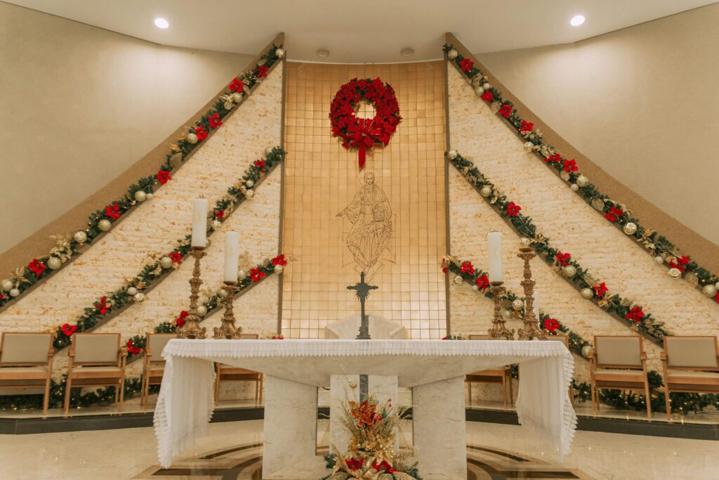 Dubai Christmas celebration inside decorated church with festive lights and community gathering for holiday mass service