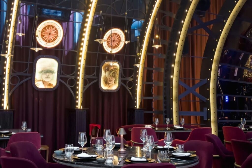 Elegant luxury restaurant interior at Atlantis Dubai featuring Michelin-starred culinary legends' fine dining establishment with sophisticated ambiance, panoramic views, and world-class service
