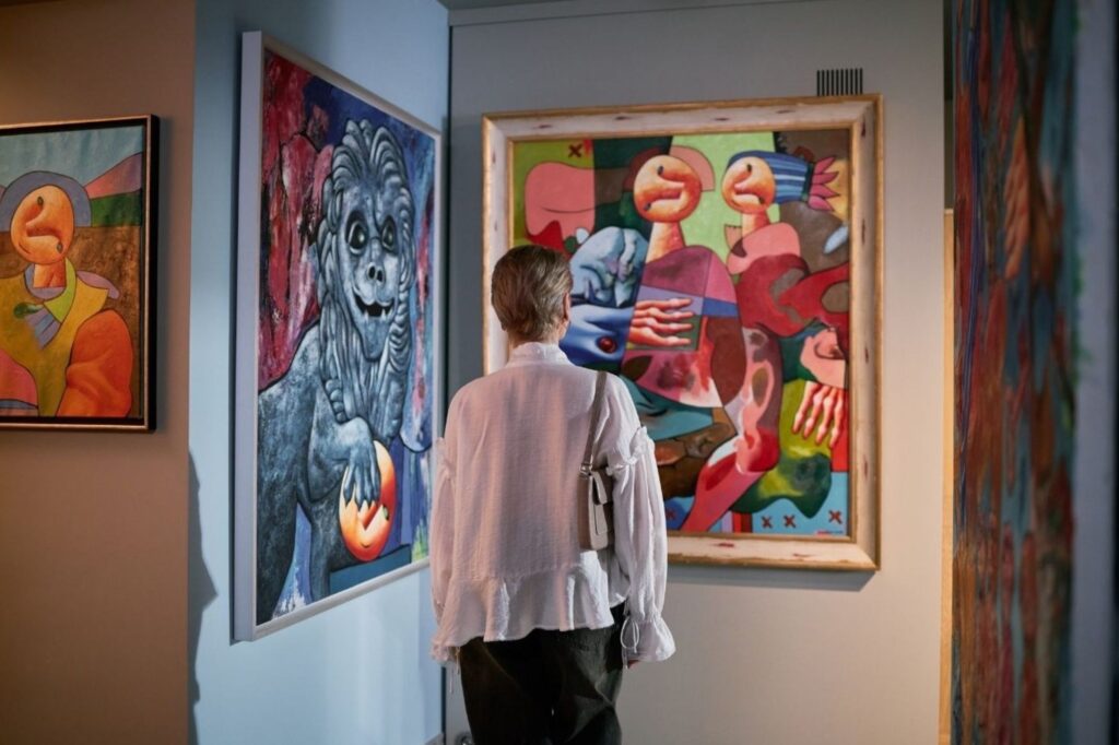 Art Dubai contemporary artwork display showing paintings and installations at collector guide exhibition venue