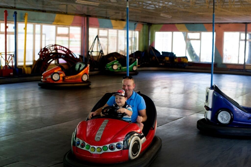 Modesh World Dubai Summer Surprises family activities showing kids entertainment rides and indoor games at Dubai World Trade Centre