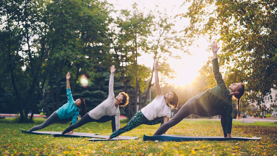 A group of residents joining a morning yoga session, a popular way to rebuild social life in Dubai during the outdoor season