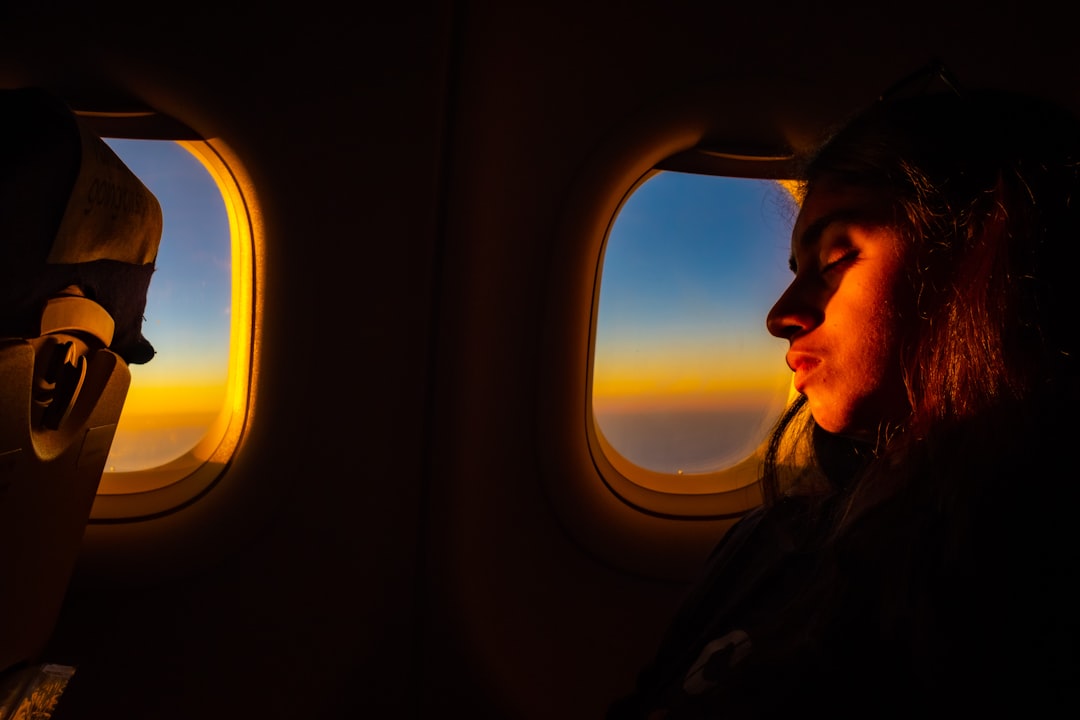 A passenger enjoying views from a window seat on one of the new Emirates routes from Dubai
