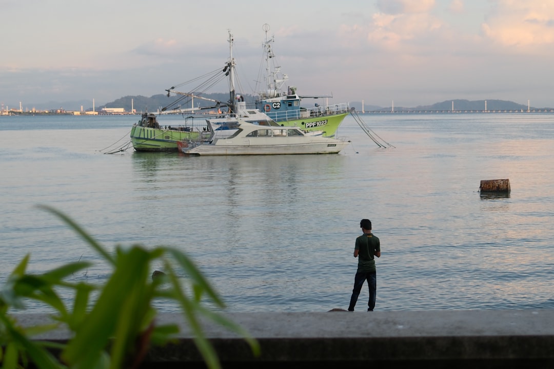 A runner completing an early morning outdoor session along a Dubai waterfront as part of a indoor training program for a race