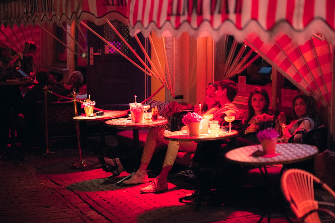 A family enjoying an immersive circus show that is part of the Dubai cultural calendar autumn season at Dubai Festival City