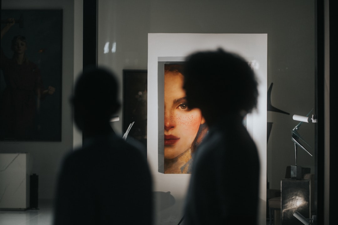 Visitors exploring a gallery exhibition as part of Dubai's cultural calendar at Alserkal Avenue in Al Quoz