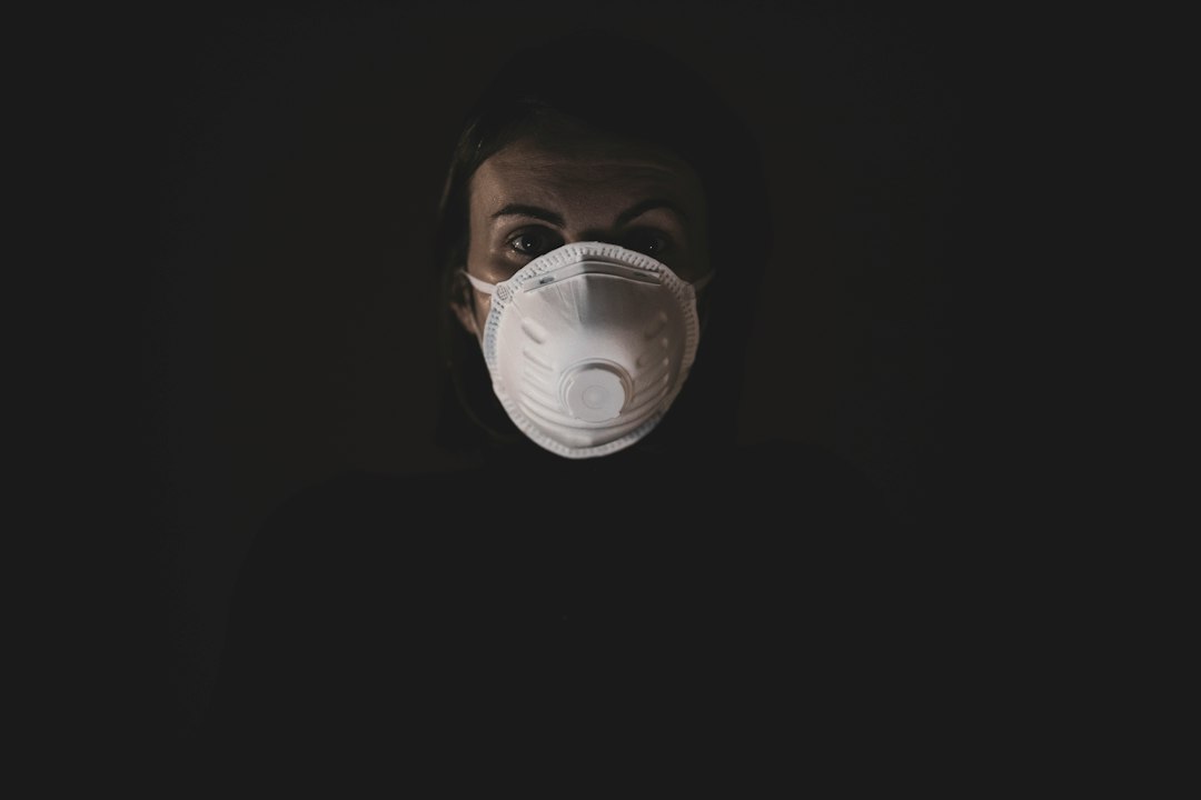 Man wears an N95 mask outdoors during haze season in Singapore