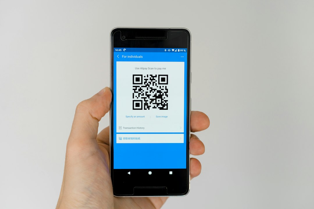 Diner scanning QR code to check hygiene grades before ordering