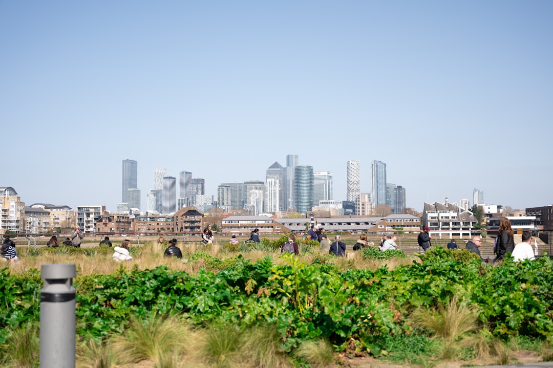 Volunteers tending a community garden in London as part of the sustainable living movement growing across the city