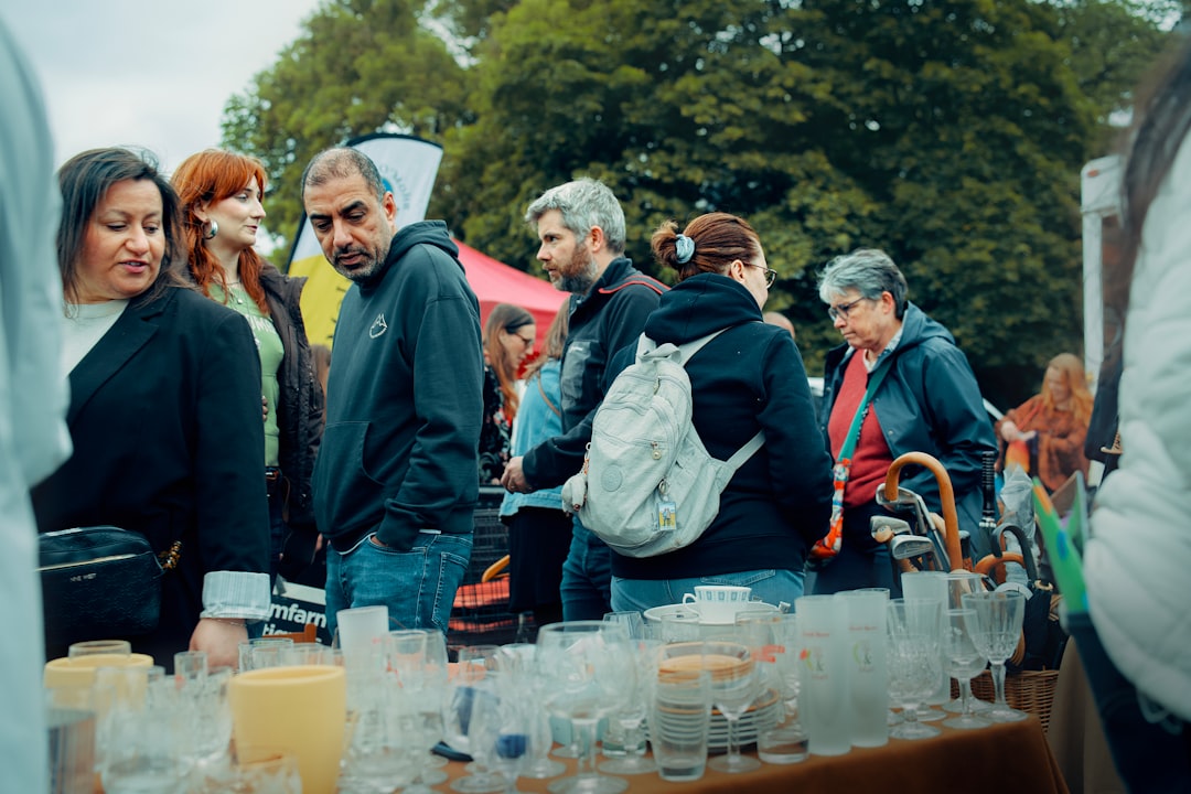 Community volunteers at a local charity stall representing the spirit of the Lambeth Country Show and its role