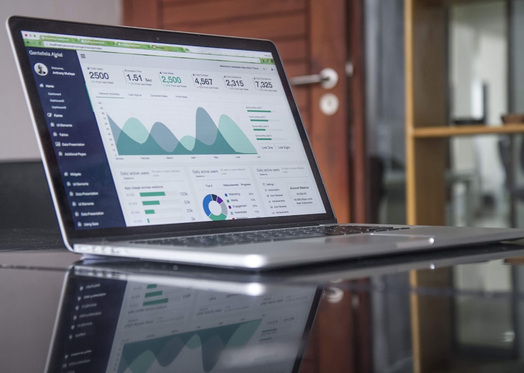A founder reviews SEIS documents and pitch materials at a desk while preparing a pre-seed funding application