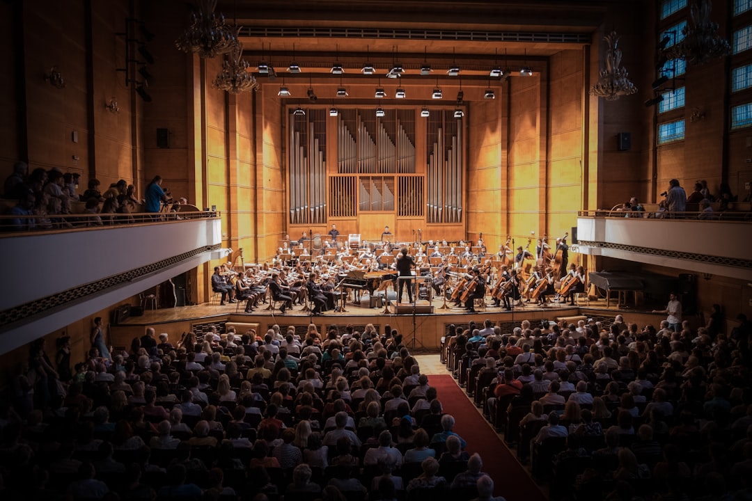 A musician performs at a BBC Proms concert, part of the festival's mid-season programming that is bringing new audiences