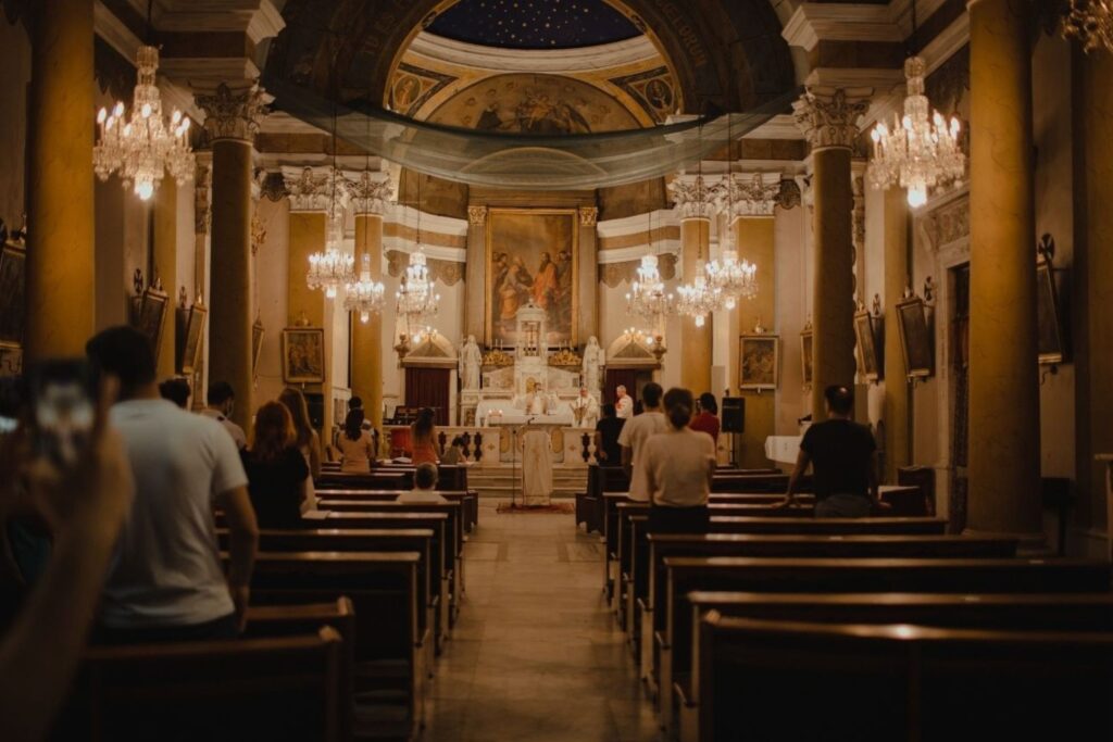 Easter Europe religious procession at historic cathedral showing traditional holiday celebrations and destinations