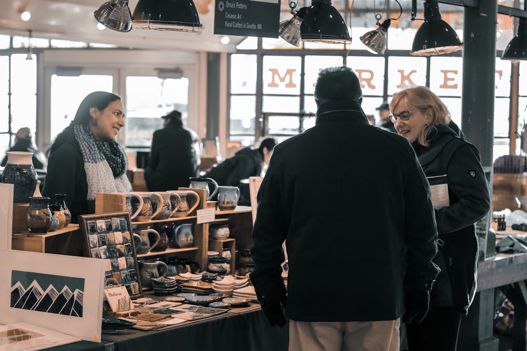 A couple comparing EU Ecolabel certified items in a sustainable goods retail store.
