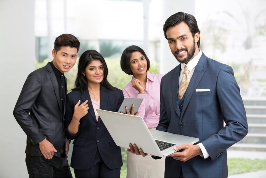 Indian investors reviewing ESG Funds performance on digital tablet showing sustainable market growth charts