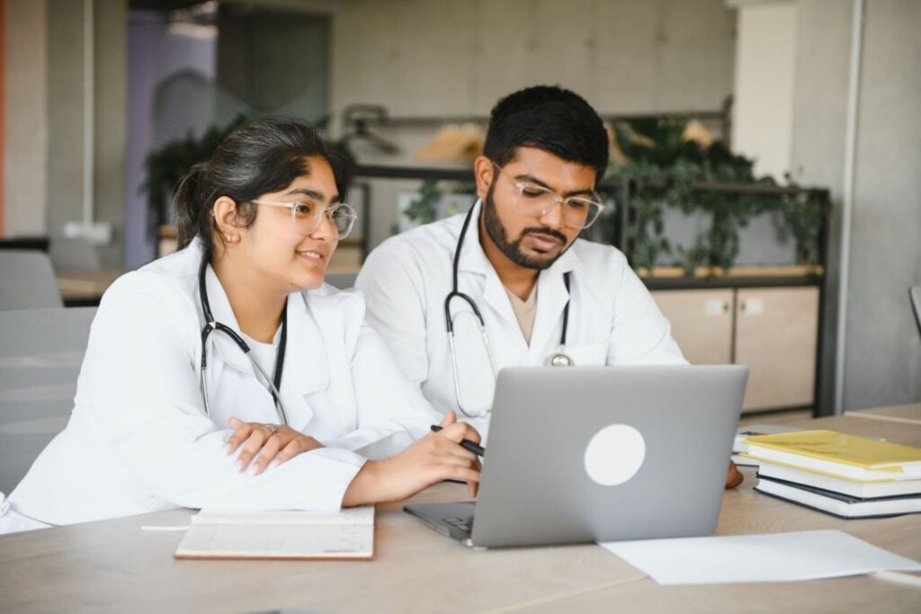 Healthcare investment India with professionals discussing private hospital sector investment opportunities