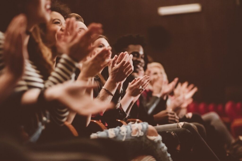 Indian cinema audience demonstrating film industry economics and theatrical entertainment revenue